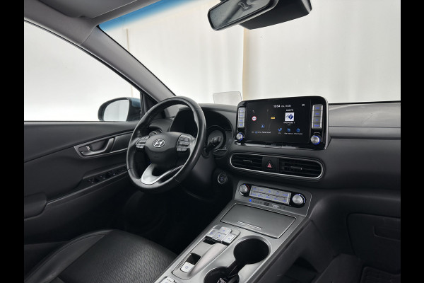 Hyundai Kona EV Premium 64 kWh (INCL-BTW) *VOLLEDER | HEAD-UP | FULL-LED | NAVI-FULLMAP | DAB | ADAPTIVE-CRUISE | KRELL-AUDIO | KEYLESS | CAMERA | BLIND-SPOT | LANE-ASSIST | VIRTUAL-COCKPIT | TOWBAR | COMFORT-SEATS | 17"AL