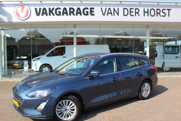 Ford FOCUS Wagon 1.0-125pk EcoBoost Mild-hybrid Titanium. Mooie, ruime, luxe en comfortabele Ford Focus wagon. Volautm. airco dual, camera, stoel-, stuur- en voorraamverw., easy entry/easy go, cruise control, Isofix, side- en lane assist, parkeersensoren v+a, LM wielen etc.