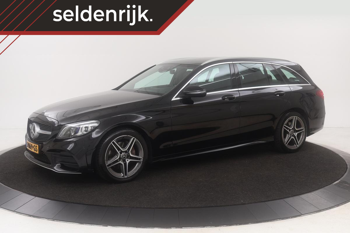 Mercedes-Benz C-Klasse 180 AMG | Carplay | Trekhaak | Stoelverwarming | Camera | Half leder | Full LED | Navigatie | Park Assist | DAB+