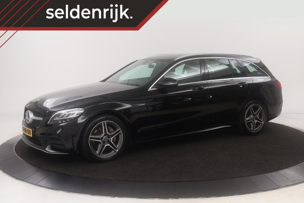 Mercedes-Benz C-Klasse 200d AMG | Stoelverwarming | Camera | Carplay | Navigatie | Full LED | Half leder | Cruise control | Park Assist | Climate control