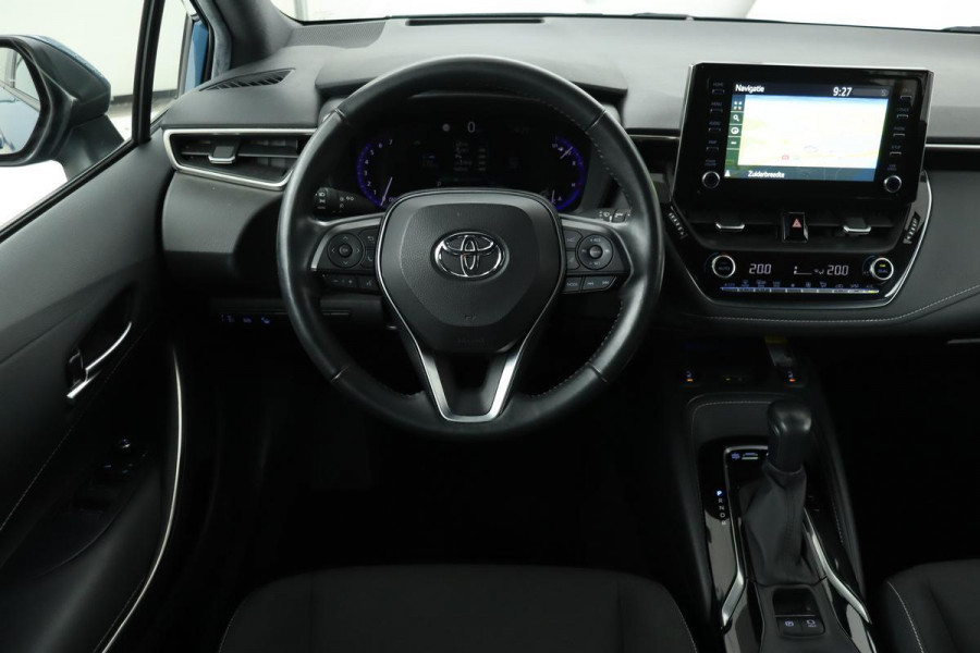 Toyota Corolla 1.8 Hybrid Intro | Head-up | Trekhaak | Stoelverwarming | Adaptive Cruise | Full LED | Camera | Navigatie | DAB+ | Keyless