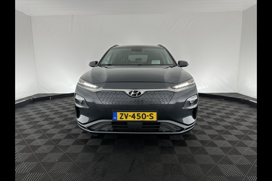 Hyundai Kona EV Premium 64 kWh (INCL-BTW) *VOLLEDER | HEAD-UP | FULL-LED | NAVI-FULLMAP | DAB | ADAPTIVE-CRUISE | KRELL-AUDIO | KEYLESS | CAMERA | BLIND-SPOT | LANE-ASSIST | VIRTUAL-COCKPIT | SHIFT-PADDLES | COMFORT-SEATS