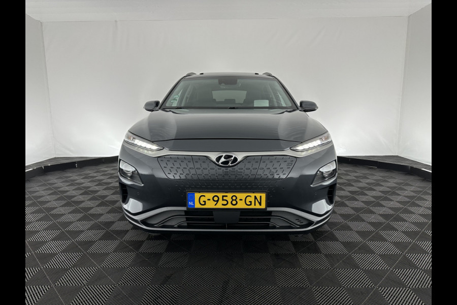 Hyundai Kona EV Premium 64 kWh (INCL-BTW) *PANO | FULL-LEATHER | HEAD-UP | FULL-LED | NAVI-FULLMAP | DAB | ADAPTIVE-CRUISE | KRELL-AUDIO | KEYLESS | CAMERA | BLIND-SPOT | LANE-ASSIST | DIGI-COCKPIT | COMFORT-SEATS | 17''AL