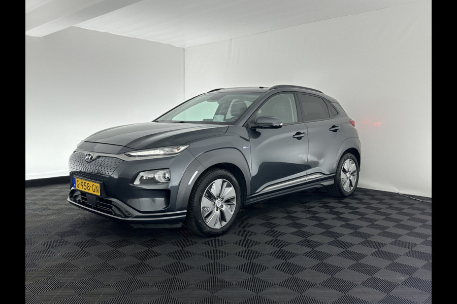 Hyundai Kona EV Premium 64 kWh (INCL-BTW) *PANO | FULL-LEATHER | HEAD-UP | FULL-LED | NAVI-FULLMAP | DAB | ADAPTIVE-CRUISE | KRELL-AUDIO | KEYLESS | CAMERA | BLIND-SPOT | LANE-ASSIST | DIGI-COCKPIT | COMFORT-SEATS | 17''AL