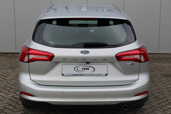 Ford FOCUS Wagon 1.0-125pk EcoBoost Mild-hybrid Titanium. Mooie, ruime, luxe en comfortabele Ford Focus wagon. Volautm. airco dual, camera, easy entry/easy go, stoel-, stuur- en voorraamverw., cruise control, Isofix, side- en lane assist, parkeersensoren v+a, LM wielen etc.