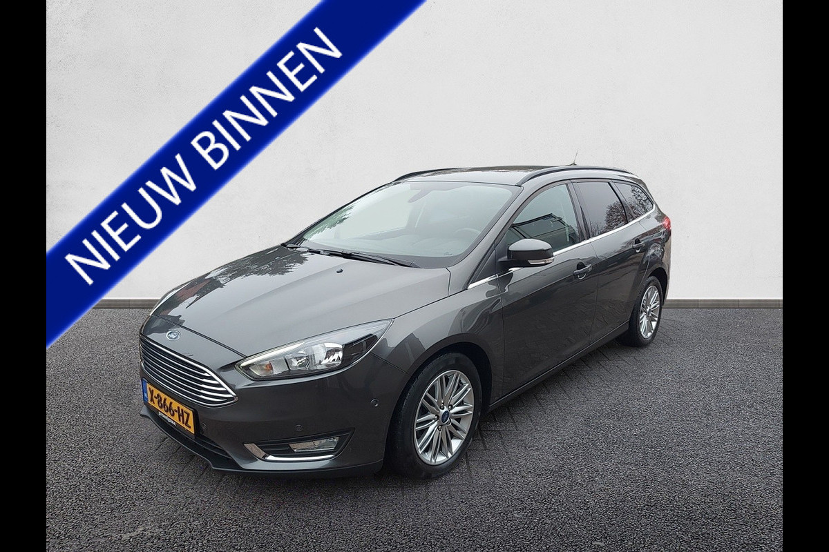 Ford FOCUS Wagon 1.0 Titanium airco,stoel/stuurverwarming,trekhaak,navigatie,parkeersensoren,Reeds nwe Distributie!!