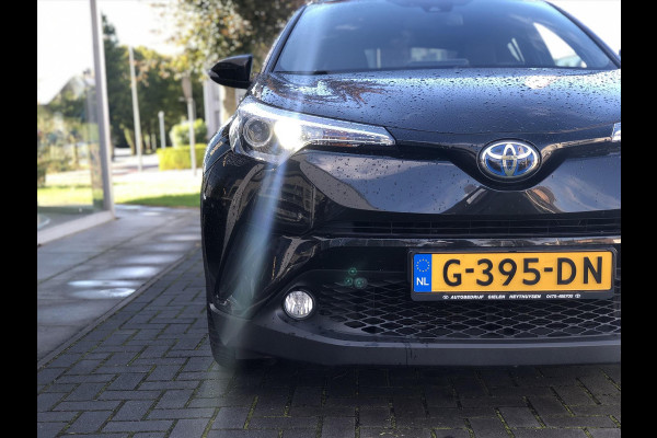 Toyota C-HR 1.8 Hybrid Executive | JBL, Trekhaak, Leer, Dodehoekherkenning, Navigatie, 18inch, Stoel + Stuurverwarming, Parkeersensoren