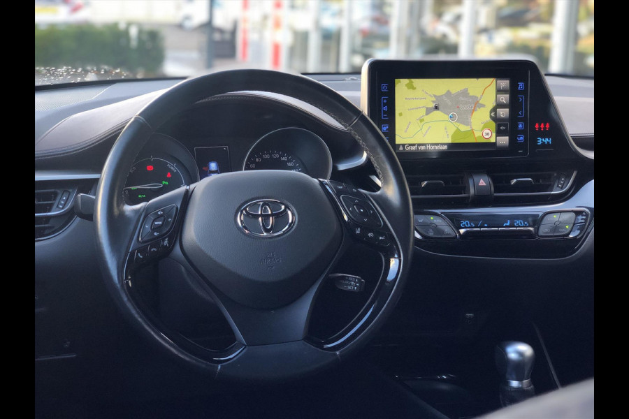 Toyota C-HR 1.8 Hybrid Executive | JBL, Trekhaak, Leer, Dodehoekherkenning, Navigatie, 18inch, Stoel + Stuurverwarming, Parkeersensoren