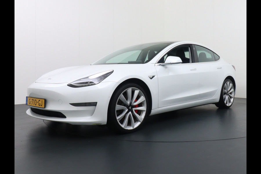 Tesla Model 3 Performance 513pk 0-100 3,4 sec. 20" FSD-vb. AutoPilot Carbon Spoiler Premium-HiFi Pano.dak Camera Leer Adaptive-Cruise+Stop&Go  4wd Rode Remklauwen Premium Audio Veel grip door 4WD vierwielaandrijving.  Origineel Nederlandse auto ! Orig.NL auto  1e eigenaar