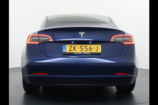 Tesla Model 3 SR+ 325PK AutoPilot Leer PanoDak Adaptive cruise 18" Camera's Elektr.-Stuur+Stoelen+Spiegels+Geheugen+Easy-Entry+Verwarmde stoel Ecc Navigatiesysteem full map LED-a+v Koplampspoeiers Comfortstoel(en) ACC Dual-ECC DAB Voorverwarmen interieur via App Keyless via Telefoonsleutel One-Pedal-Drive Origin. NLse auto ! 1e eigenaar