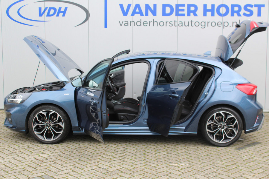 Ford Focus 1.0-125pk EcoBoost ST-Line Business AUTOMAAT ! Gun u het comfort en gemak van deze zeer nette en luxe Ford Focus automaat ! Volautm. airco, LED verl., trekhaak, LM wielen, stoel-, stuur- en voorraamverw., adapt. cruise cntrl, lane assist, camera, B&O soundsyst. etc.