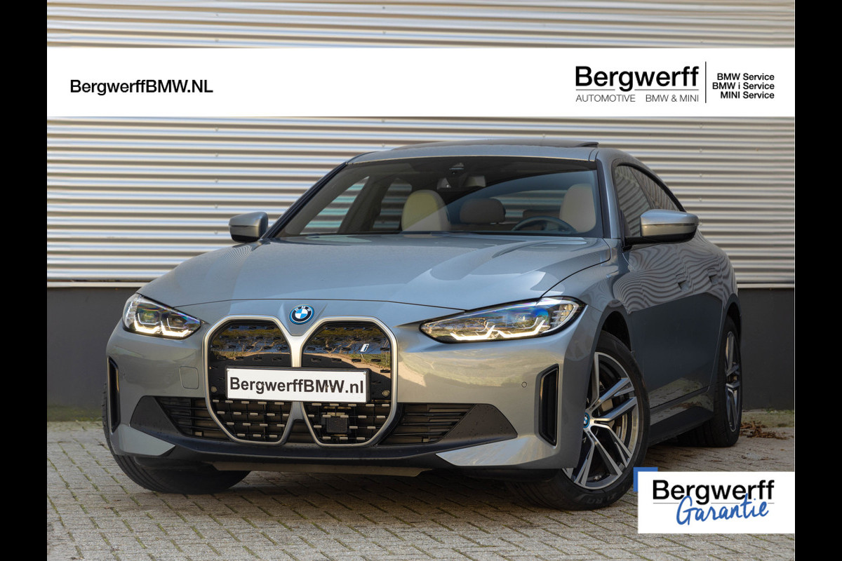 BMW i4 eDrive40 - Dak - Camera - Stoel + Stuurwiel Verwarmd - Leder Interieur