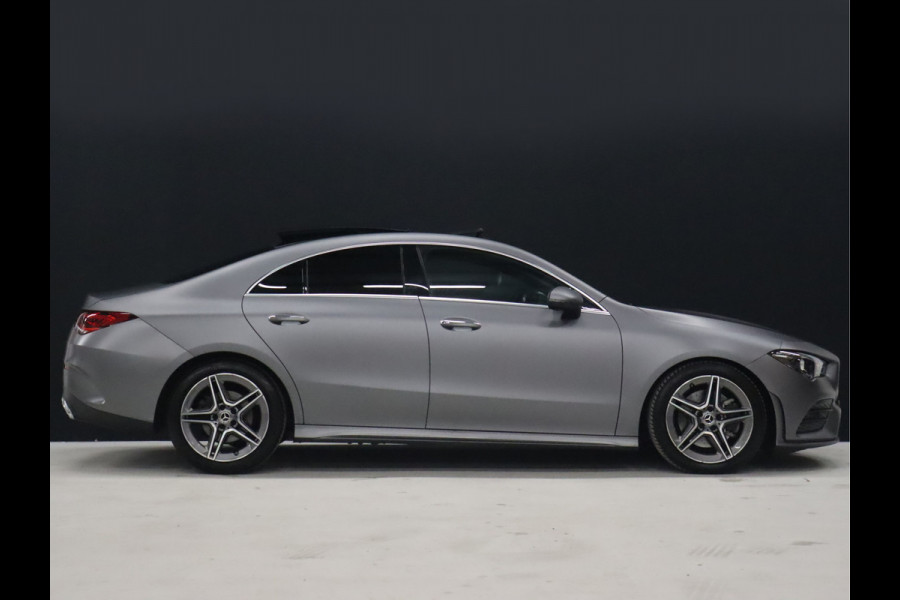 Mercedes-Benz CLA-Klasse 200 AMG Sport FULL OPTION [SCHUIFDAK, SFEERVERLICHTING, CAMERA, LAK MOJAVESILVER, GROOT NAVI, SPORTSTOELEN, PDC, CRUISE CONTROL, AIRCO, NIEUWSTAAT]