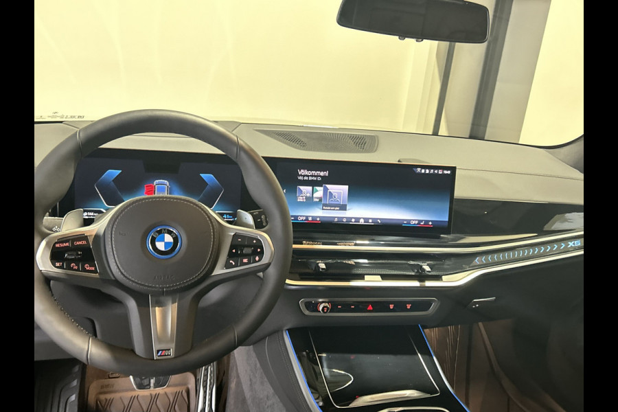 BMW X5 xDrive50e | Driving assistent pro | Skylounge panoramadak | Alle zetels verwarmbaar!