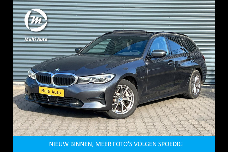 BMW 3 Serie Touring 330e Sportline Plug in Hybrid PHEV | Trekhaak af Fabriek | Panodak | Laser Led | Adaptive Cruise | Head-up Display | Carplay | Sportstoelen Verwarmd |