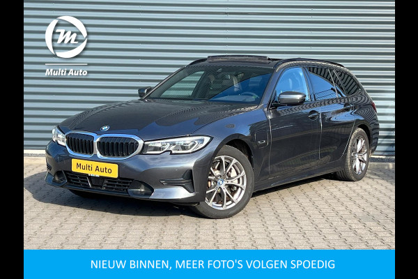 BMW 3 Serie Touring 330e Sportline Plug in Hybrid PHEV | Trekhaak af Fabriek | Panodak | Laser Led | Adaptive Cruise | Head-up Display | Carplay | Sportstoelen Verwarmd |