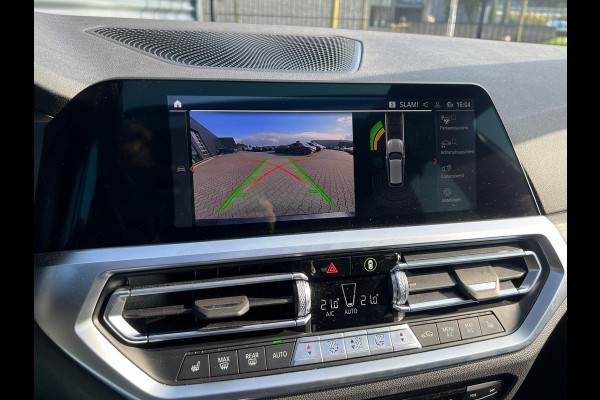 BMW 3 Serie Touring 330e Sportline Plug in Hybrid PHEV | Trekhaak af Fabriek | Panodak | Laser Led | Adaptive Cruise | Head-up Display | Carplay | Sportstoelen Verwarmd |