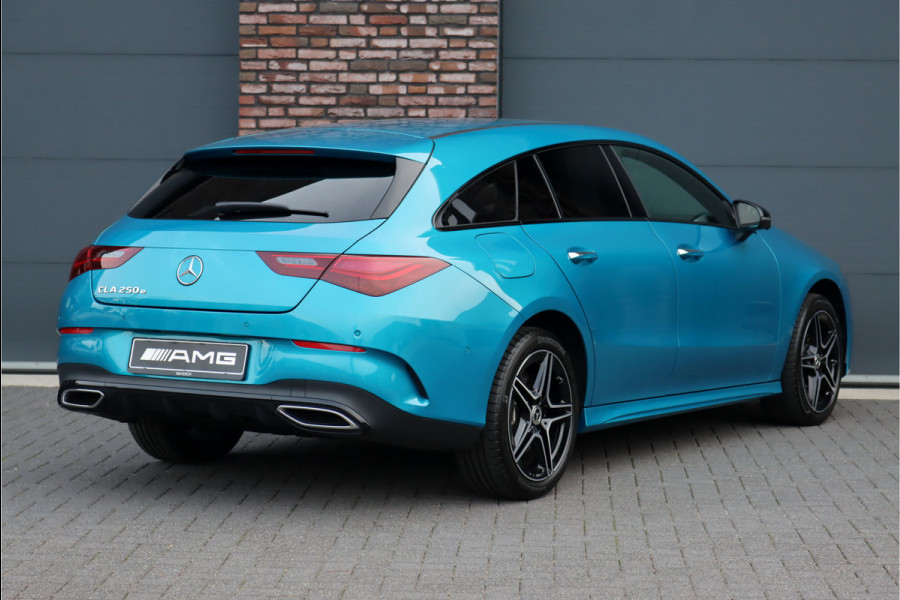 Mercedes-Benz CLA-Klasse Shooting Brake 250 e AMG Line Aut8 | Face Lift | Distronic Pro | Memory | Trekhaak | Nightpakket | Keyless Go | Sfeerverlichting | Verwarmd Stuurwiel | Surround Camera | Advanced Sound System | Augmented Reality |