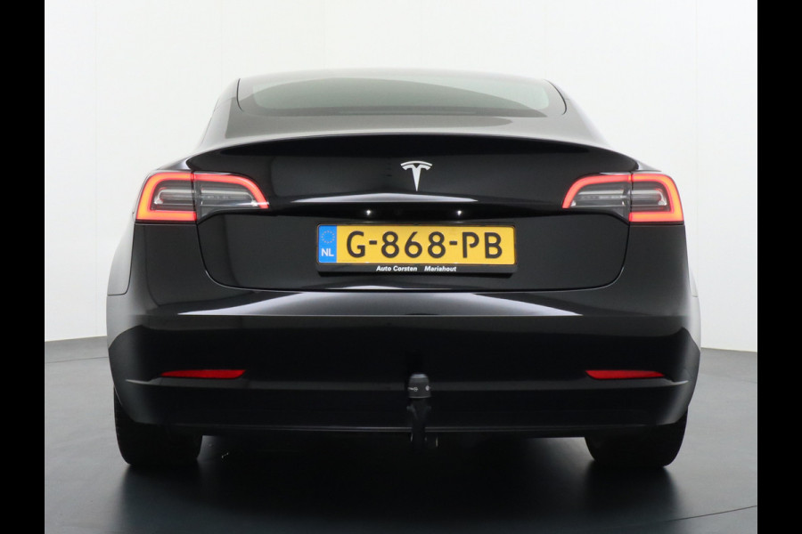 Tesla Model 3 SR+60kWh 325PK Trekhaak AutoPilot FSD.vb Leer PanoDak Adaptive cruise 19" Camera's Elektr.-Stuur+Stoelen+Spiegels+Geheugen+Easy- Ecc Navigatiesysteem full map LED-a+v Comfortstoel(en) ACC Dual-ECC DAB Voorverwarmen interieur via App Keyless via Telefoonsleutel One-Pedal-Drive