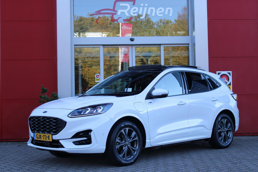 Ford Kuga 2.5 PHEV 225PK AUTOMAAT ST-LINE | ELEKTRISCH WEGKLAPBARE TREKHAAK | ALLE SEASON BANDEN | 360° CAMERA | ELEKTRISCH BEDIENBARE ACHTERKLEP | WINTER PACK: STOEL/STUUR/VOORRUIT VERWARMING | 18" LICHTMETALEN VELGEN | PANORAMISCH SCHUIF/KANTEL DAK | DODEHOEK DETECTIE | ADAPTIVE CRUISE CONTROL | HEAD UP DISPLAY | DEUR BESCHERMERS | DRAADLOZE TELEFOONLADER | ACHTERBANK VERWARMD | KEYLESS ENTRY/START |