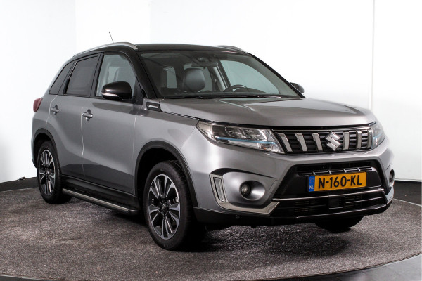 Suzuki Vitara 1.4 130 PK Boosterjet Style Smart Hybrid - Automaat | Adapt. Cruise | Stoelverwarming | Camera | PDC | NAV. + App. Connect | Auto. Airco | Afn. Trekhaak  | DAB | LM 17"|