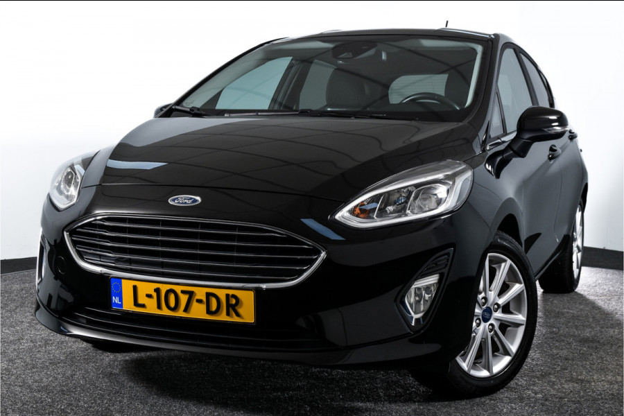 Ford Fiesta 1.0 EcoBoost Titanium | Cruise | Stoel + Stuurverwarming | PDC | App.Connect | DAB | Auto.Airco | Trekhaak | LM 16" |