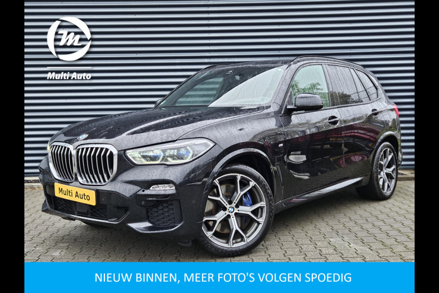 BMW X5 xDrive45e M Sport Plug In Hybrid 394pk INCL BTW PHEV | Panodak | Trekhaak af fabriek | Adaptive Cruise | Laser LED | Head Up | 21"L.M | Carbonpakket |