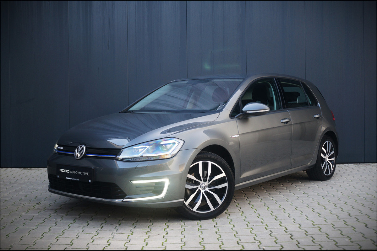 Volkswagen e-Golf E-DITION | Virtual | Warmtepomp | Adaptive Cruise Control | Led | NAP | Stoelverwarming | Groot Scherm | BTW | Subsidie | 1e Eig. | PDC | Climate Control | LM Velgen | Navigatie |