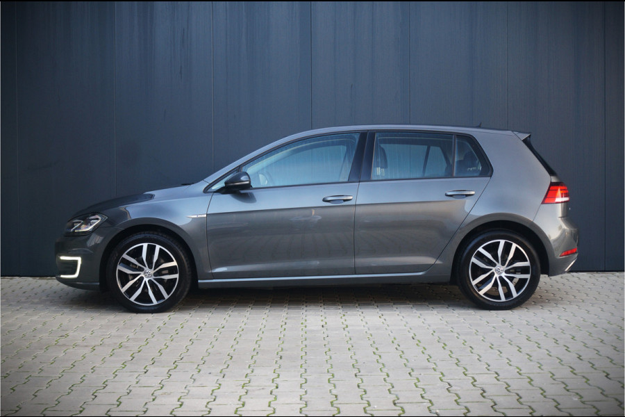 Volkswagen e-Golf E-DITION | Virtual | Warmtepomp | Adaptive Cruise Control | Led | NAP | Stoelverwarming | Groot Scherm | BTW | Subsidie | 1e Eig. | PDC | Climate Control | LM Velgen | Navigatie |