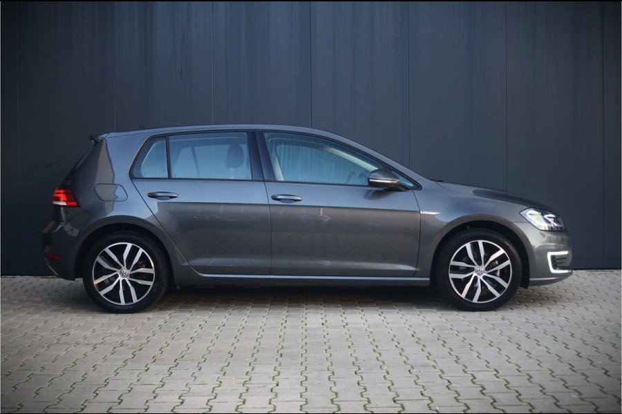 Volkswagen e-Golf E-DITION | Virtual | Warmtepomp | Adaptive Cruise Control | Led | NAP | Stoelverwarming | Groot Scherm | BTW | Subsidie | 1e Eig. | PDC | Climate Control | LM Velgen | Navigatie |