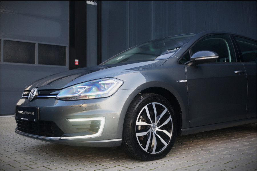 Volkswagen e-Golf E-DITION | Virtual | Warmtepomp | Adaptive Cruise Control | Led | NAP | Stoelverwarming | Groot Scherm | BTW | Subsidie | 1e Eig. | PDC | Climate Control | LM Velgen | Navigatie |