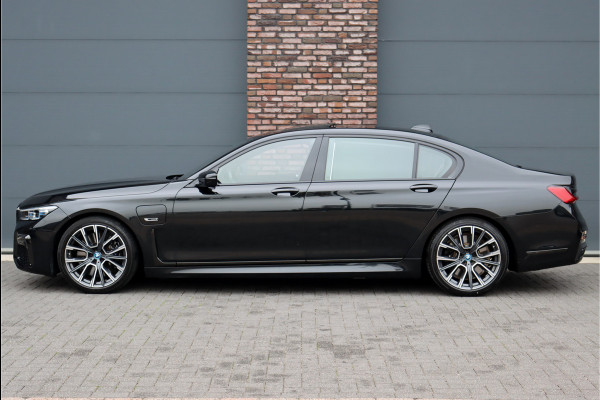 BMW 7 Serie 745Le M Sport High Executive Aut8 | Schuifdak | Luchtvering | Achterasbesturing | Adaptieve Cruise Control | Zonnescherm Zijruiten | Harman&Kardon | Verwarmd Stuurwiel | Stoelventilatie | Soft-Close | HUD | Laserl