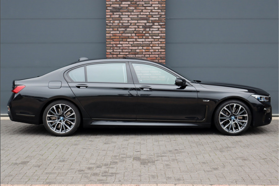 BMW 7 Serie 745Le M Sport High Executive Aut8 | Schuifdak | Luchtvering | Achterasbesturing | Adaptieve Cruise Control | Zonnescherm Zijruiten | Harman&Kardon | Verwarmd Stuurwiel | Stoelventilatie | Soft-Close | HUD | Laserl