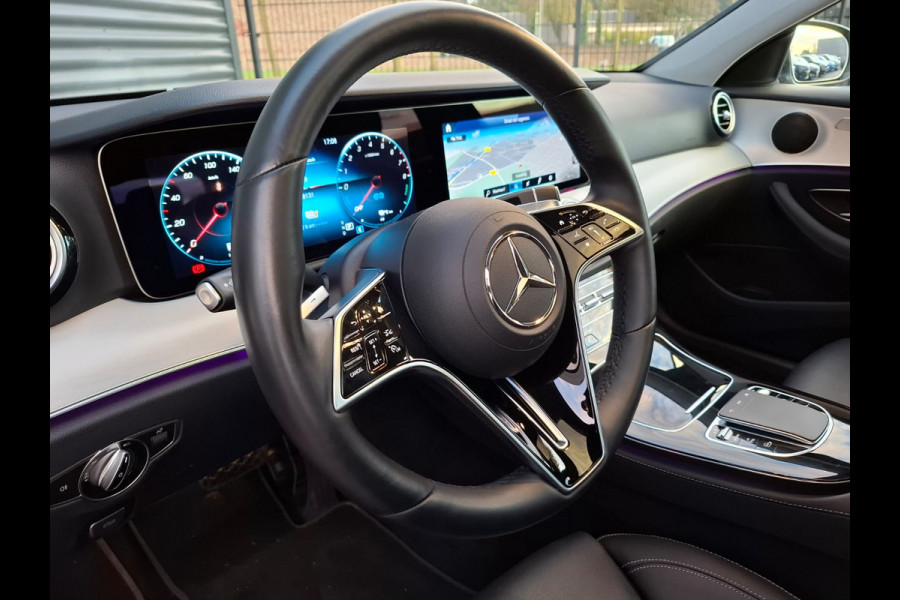 Mercedes-Benz E-Klasse Estate 300 e AMG Line Plug in Hybrid PHEV | Schuifdak | Lederen Sportstoelen | Trekhaak af Fabriek | Adaptive Cruise | Apple Carplay | Widescreen Navi | Sfeerverlichting | Camera |