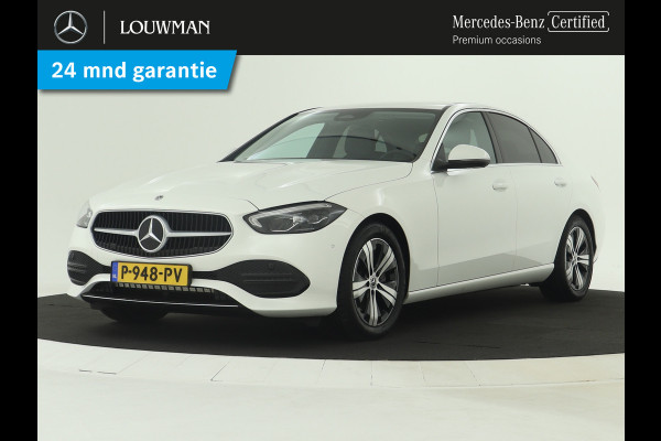 Mercedes-Benz C-Klasse 200 Launch Edition Luxury Line | Achteruitrijcamera | Dodehoekdetector | Sfeerverlichting | Navigatie | Inclusief 24 maanden MB Certified garantie voor Europa.