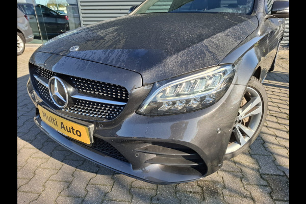 Mercedes-Benz C-Klasse Estate 300 e AMG Line Plug in Hybrid 320pk PHEV | Panodak | Luchtvering | Lederen Alcantara Sportstoelen Verwarmd | Burmester Audio | Adaptive Cruise | Navigatie | Apple Carplay |