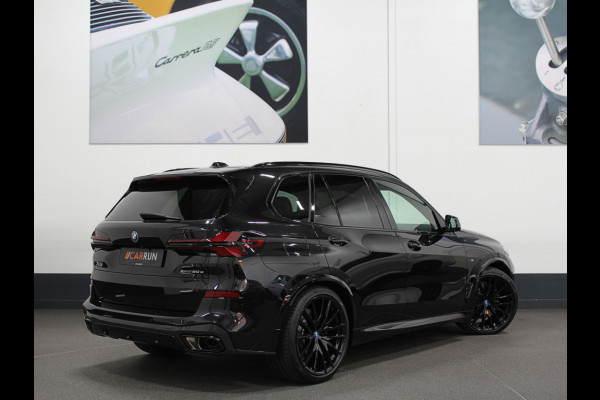 BMW X5 xDrive50e M-Performance Seats | M-Sport Pro | 360 View | ACC | Panorama | Soft-Close | Carbon | Ambiente Geur & verlichting | Head-Up | Stoelventilatie | Memory | Drive-Recorder | Harman-Kardon | 22'' | Laser-LED | Zonwering | Iconic-Glow | 4-Zone Clima | Trekhaak | Keyless-Entry | Leder-Pakket | ISO-Glas | Luchtvering | Draadloos laden | Carplay |