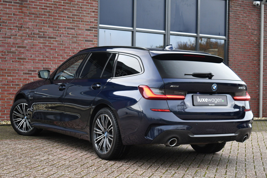 BMW 3 Serie Touring 330e xDrive M-Sport Pano Trekhaak Camera HiFi