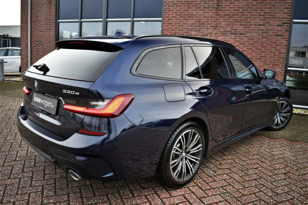 BMW 3 Serie Touring 330e xDrive M-Sport Pano Trekhaak Camera HiFi