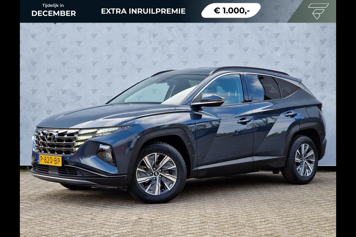 Hyundai Tucson 1.6 T-GDI HEV Automaat | Camera | Navi | Clima | Stoelverwarming | Apple CarPlay/Android Auto | 17" Velgen | PDC | Cruise | LED |