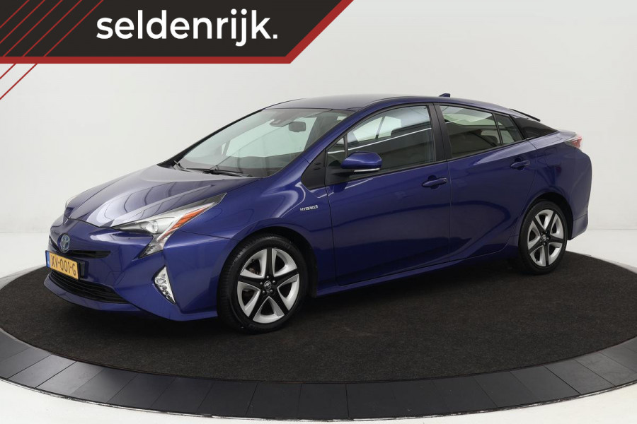 Toyota Prius 1.8 Dynamic | Stoelverwarming | Trekhaak | Adaptive cruise | Camera | Head-Up | Full LED | Navigatie | Keyless | Climate control