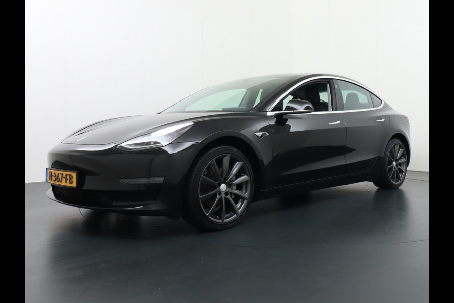 Tesla Model 3 Long Range 75kWh 463PK Full Self Driving 3 computer FSD v.b. Lmv 19" Premium-Audio 4wd Dual Motor AutoPilot Panoramadak Camera's Stoel en achterbank verwarming Keyless Electr.Stoelen-L+R+Easyaccess 1e Maand Gratis Premium Connectivity! Origineel Nederlandse auto! Grip en veiligheid door 4wd AWD vierwielaandrijving