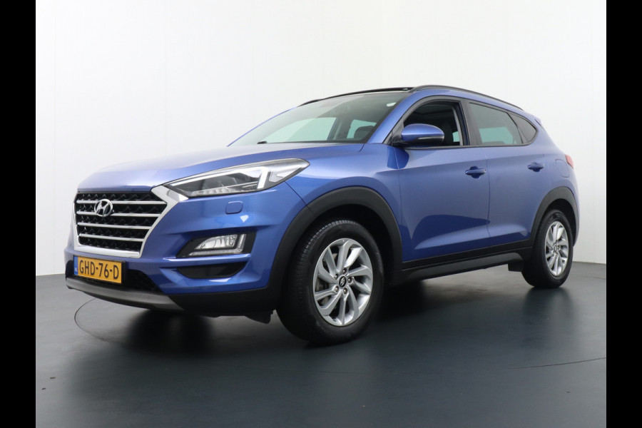 Hyundai Tucson T177PK AUT.7 Leer Panorama-Dak Camera Apple Carplay - Android Navi PDC Schuif-K-Dak Cruise control DAB Bluetooth Led Regen-Licht 17"LM Voorruit verwarmd DBC Voetgangersbescherming ESC Privacy Glas Kopl-rein-inst Afdaal assistent Verkeersbord detectie Comfort Spraakherkenningssysteem 42.000 nieuw ! 1600kg trekvermogen!