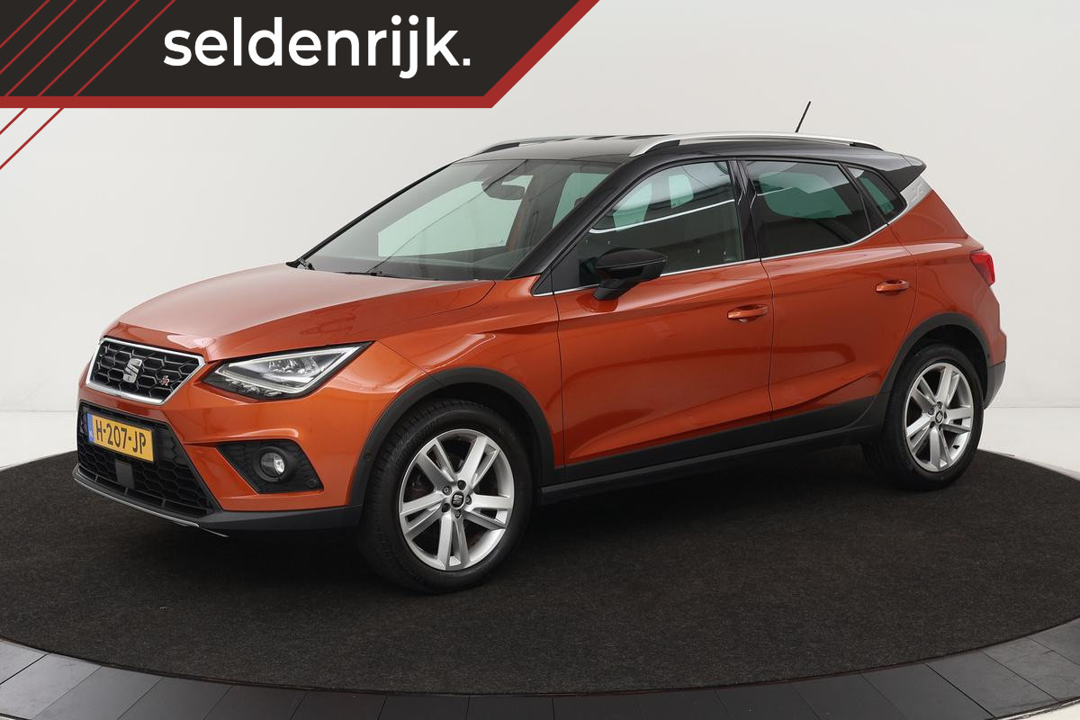 Seat Arona 1.0 TSI FR Intens | Stoelverwarming | Trekhaak | Leder/Alcantara | Adaptive cruise | Camera | Virtual Cockpit | Carplay | Full LED | Dodehoek detectie | Navigatie | Keyless