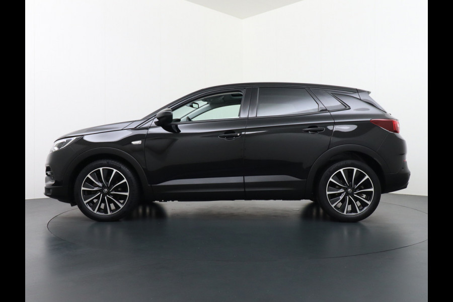 Opel Grandland X 1.6T 180PK Automaat Apple Carplay Android Auto Panoramadak Navi Ecc 360° Camera DAB Bluetooth Draadloze tel.lader Denon® Sound Dodehoek detector Lane Assist Lmv 19" Regen-Licht Sensor Pdc Adaptief licht Led Business Elegance 1e Eigenaar