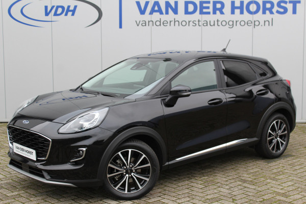 Ford Puma 1.0-125pk EcoBoost Mild-Hybrid Titanium. Garantie t/m 05-03-2028 ! Slechts 3.200km ! Stuur-, stoel- en voorraamverw., airco, navigatie, telefoonvoorb,. LM wielen, elektr. achterklep, LED verlichting, cruise control, keyless entry/keyless go etc.