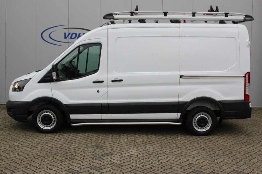 Ford Transit 290 2.0-105pk TDCI L2H2 Ambiente. Dames en heren ondernemers, u kunt direct los: compleet ingerichte Ford Transit ! Camera, parkeersensoren v+a, airco, ladder op achterdeur, opstaptrede met trekhaak, imperiaal met ladder, omvormer naar 220V voor opladen gereedschap etc etc.