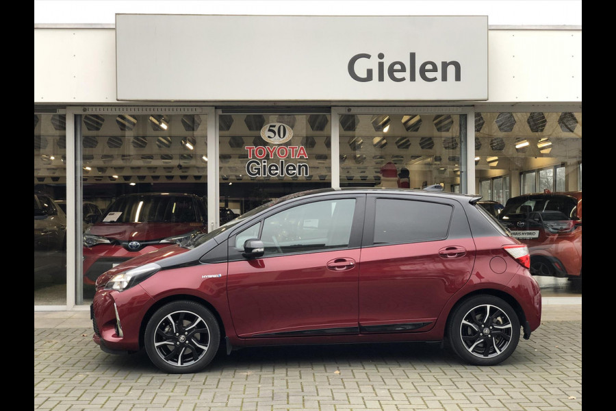 Toyota Yaris 1.5 Hybrid Bi-Tone | Eerste eigenaar, 16 inch, Spoiler, Cruise control, Parkeercamera, Safety sense, Climate control