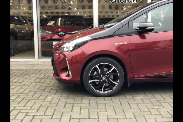 Toyota Yaris 1.5 Hybrid Bi-Tone | Eerste eigenaar, 16 inch, Spoiler, Cruise control, Parkeercamera, Safety sense, Climate control