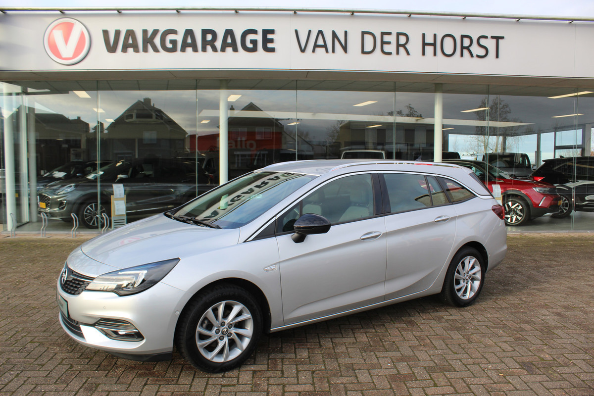 Opel Astra Sports Tourer 1.2 110 pk Business Elegance Volautm. airco dual, cruise control, navigatie, telefoonvoorb., Isofix, metallic lak, LM wielen, stuur- en stoelverwarming, lane- en side assist, camera, parkeersensoren v+a etc.